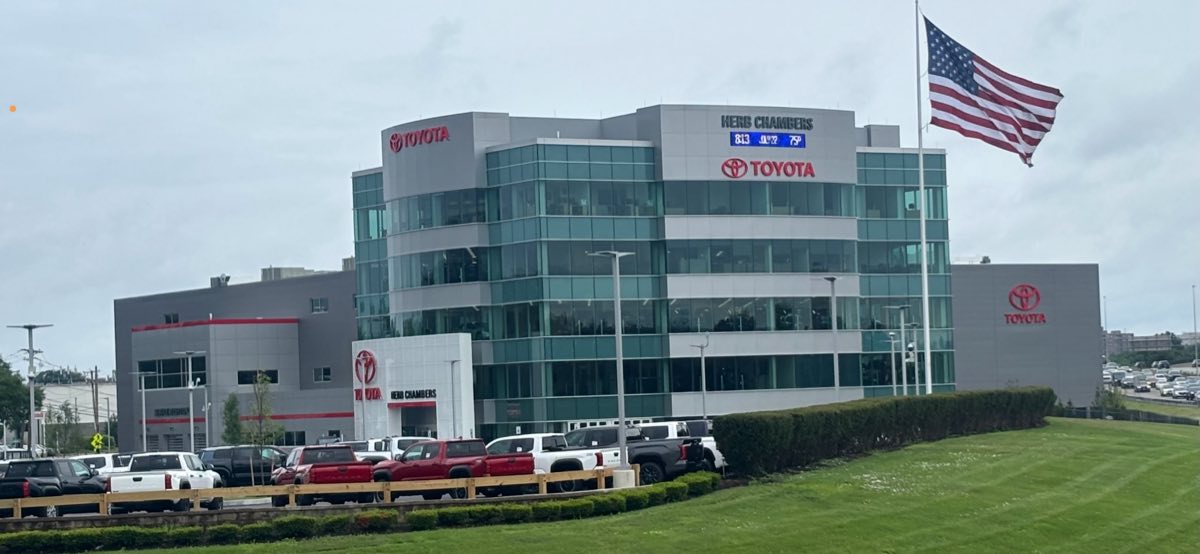 The Herb Chambers Toyota dealership on Mystic Avenue in Medford, Massachusetts, seen across the lot.